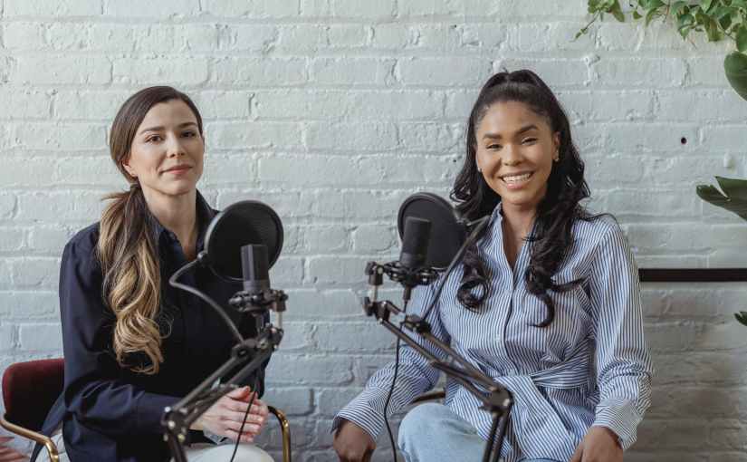 delighted black woman at remote radio broadcast